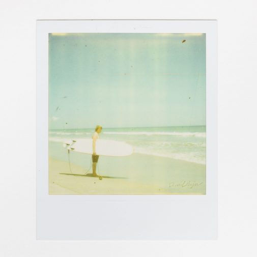 Surfing photo shot on Impossible Project polaroid film with sx-70 camera.