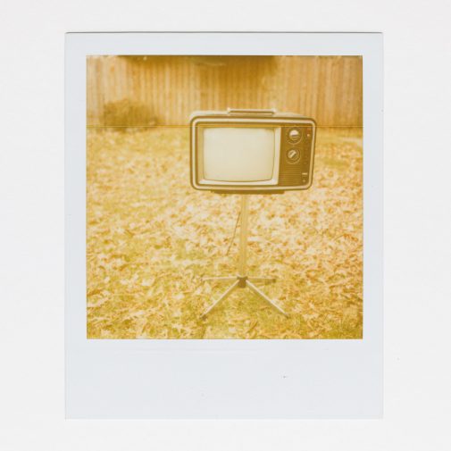 Old TV with stand, photographed on Polaroid 600 instant film with an SX-70