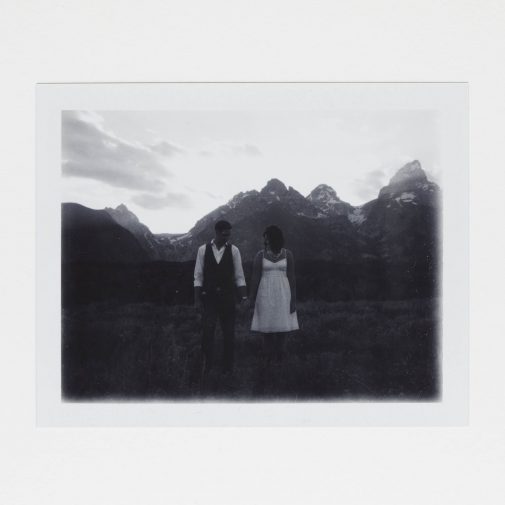 Wedding photos on Polaroid in front of Grand Tetons.