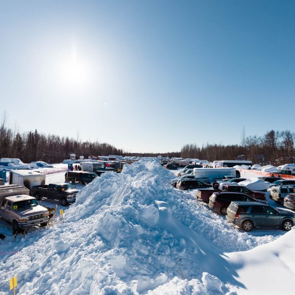 Trailers line the parking lot as mushers prepare for the race.