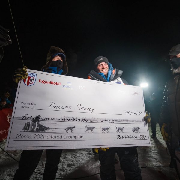 Iditarod 49 Champion, Dallas Seavey, receives check.