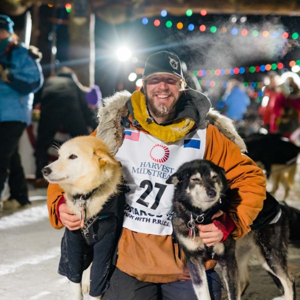 Iditarod 2022 Champion Brent Sass with His Lead Dogs
