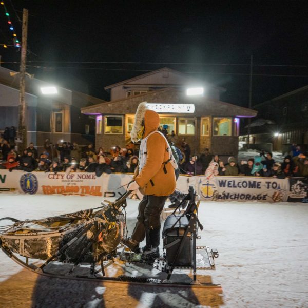Brent Sass arriving at the finish line in Nome, Alaska.