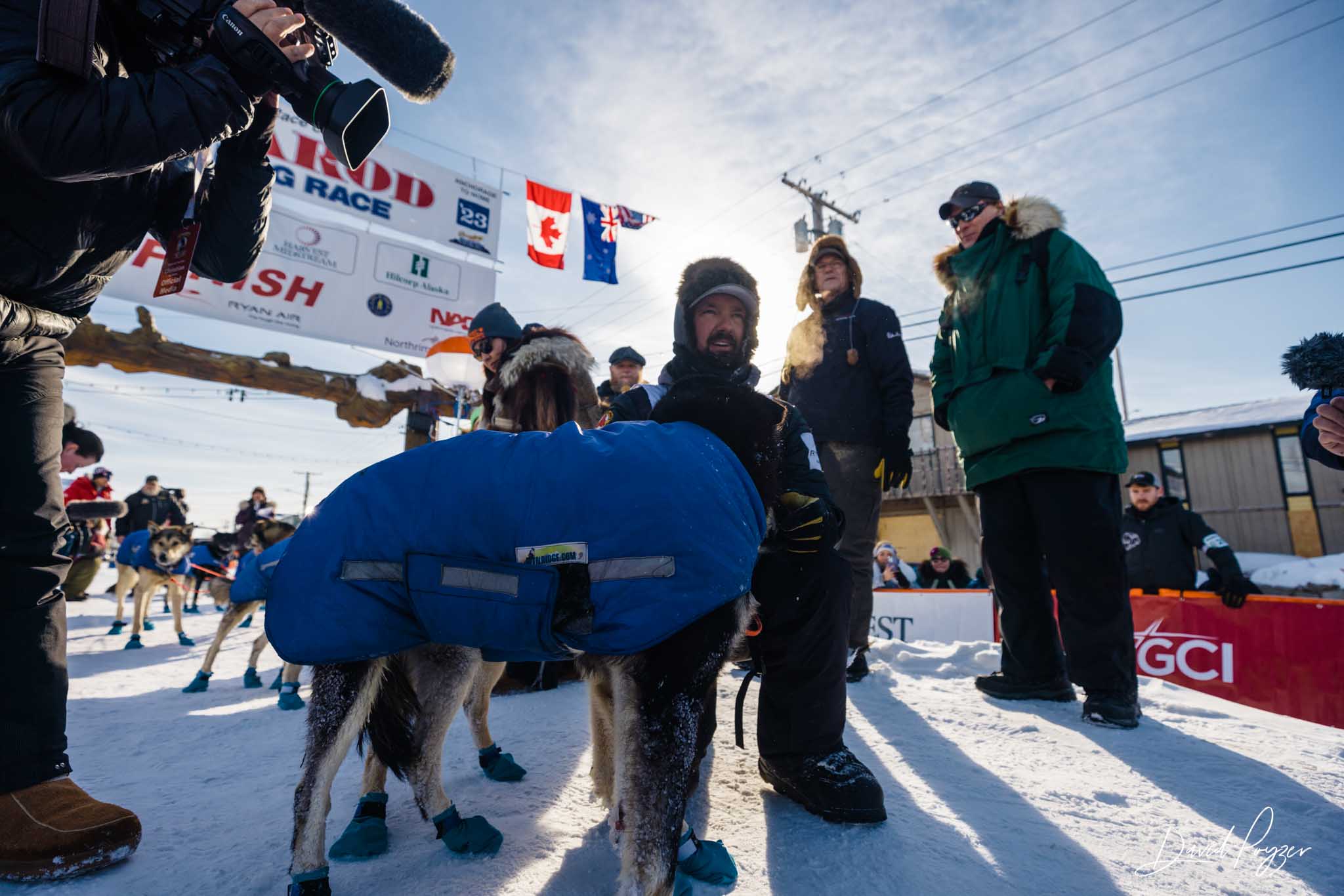 Peter Kaiser at Iditarod Finish 3 – 2023 Nome - Dave Poyzer